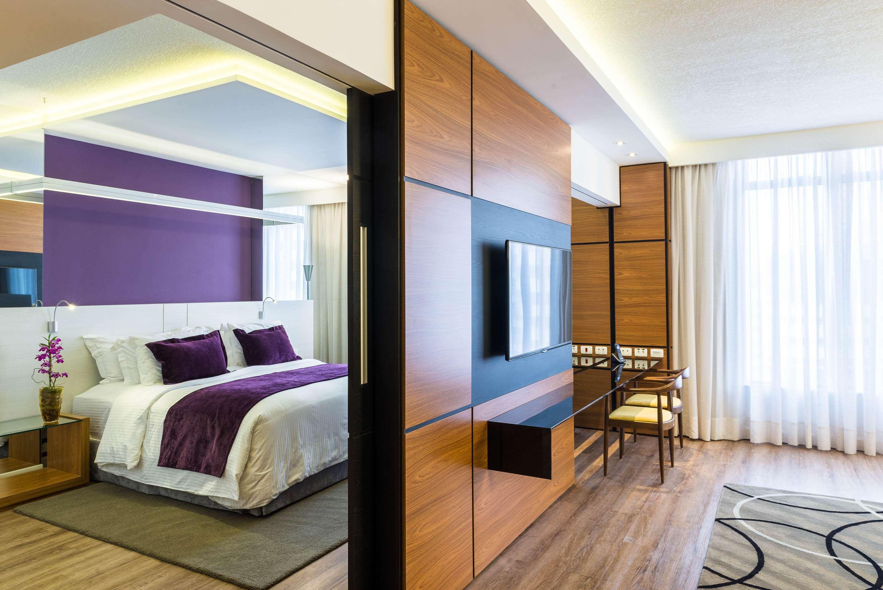 Radisson Hotel Curitiba Dış mekan fotoğraf A bedroom at the hotel